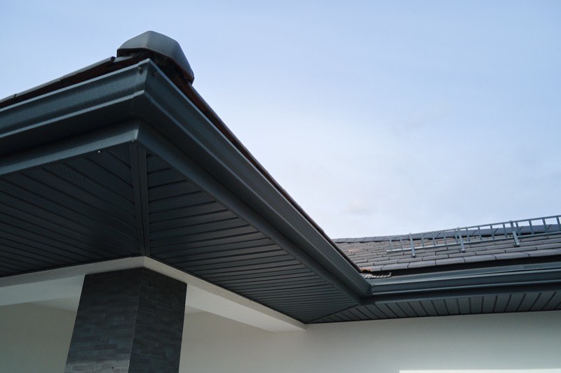 Industrial-grade gutters installed on a Long Island building