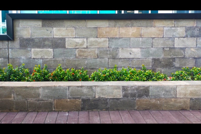 Stone retaining wall built on a Long Island property